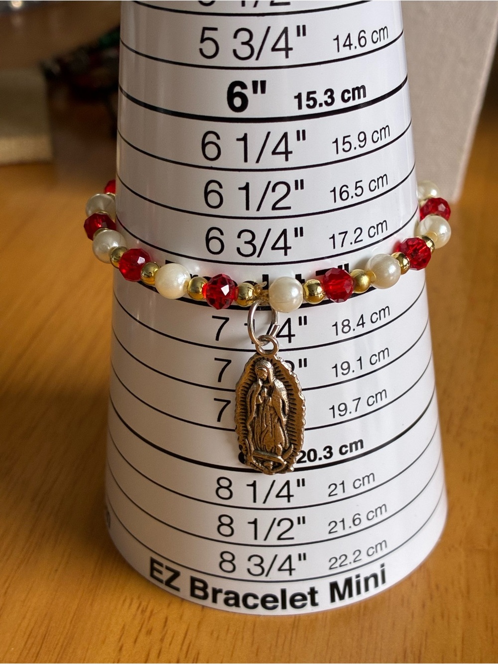 Gold Madonna Charm Bracelet with Red Crystal and Pearl Beads